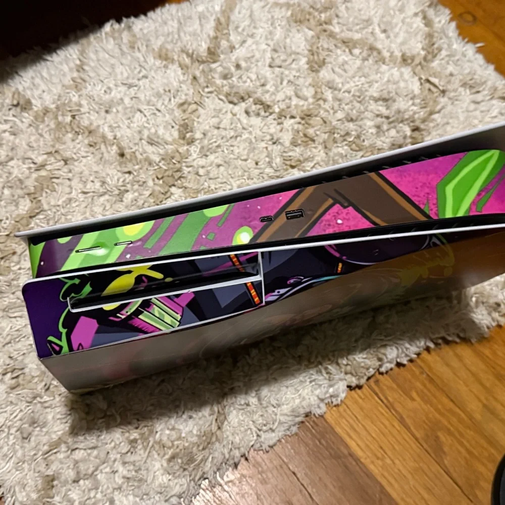 Sony Custom Console with Black and Multicolor Controllers